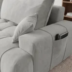 Nowoczesny-naroznik-z-funkcja-spania-pojemnikiem-i-kieszonka-na-boczkach-capri-jasnoszary9